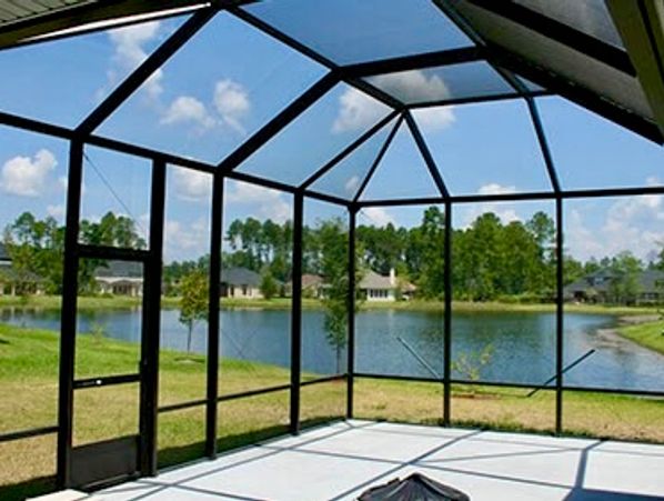 Patio enclosure above pool
