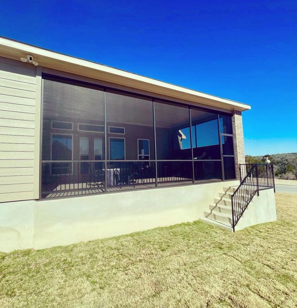 Outside view of a patio enclosure designed and installed in San Antonio, Texas