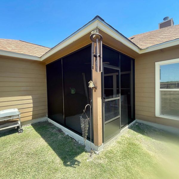 After a view of a patio enclosure