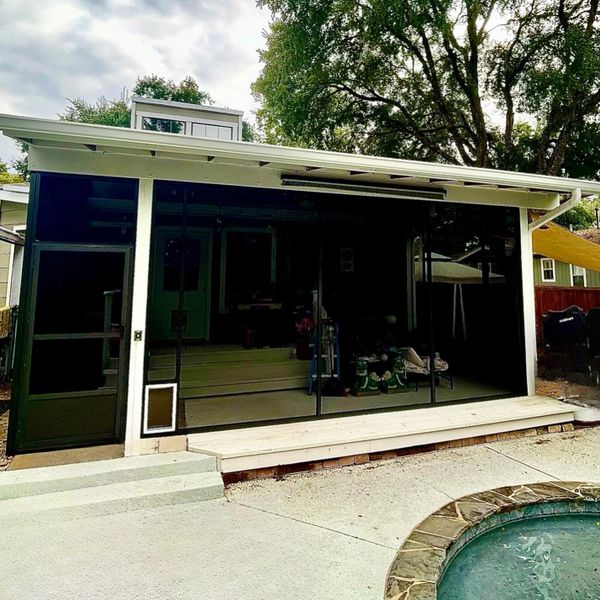 The patio enclosure was designed and installed in San Antonio, Texas