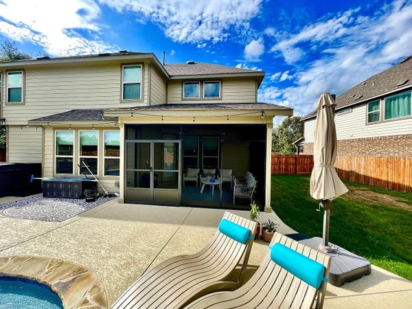 Patio enclosure was designed and installed in Helotes, Texas