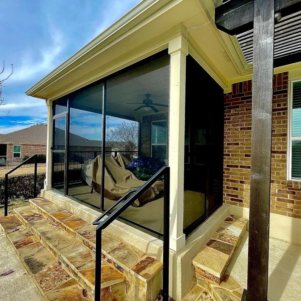 The patio enclosure was designed and installed in San Antonio, Texas