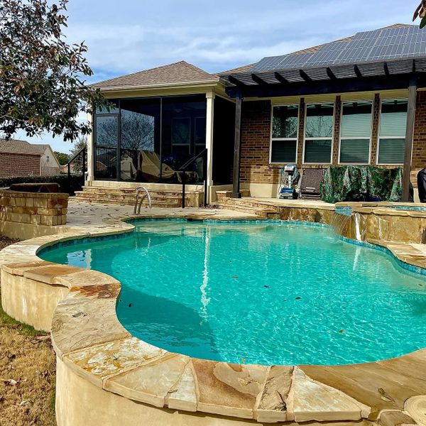 Outside view of a patio enclosure installed in San Antonio, Texas