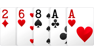 poker hand five cards showing one pair