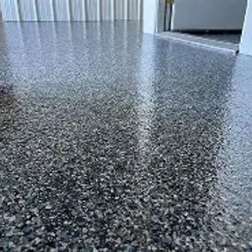 Shiny speckled epoxy-coated floor inside a room.