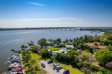 Real Estate Aerial Photography showing the surrounding areas beach