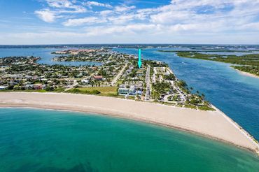 Real Estate Aerial Photography showing the surrounding areas beach