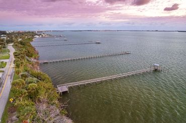 Real Estate Aerial Photography showing the surrounding areas beach