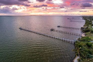 Real Estate Aerial Photography showing the surrounding areas beach