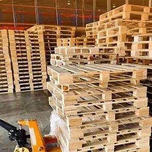 KC Pallets team removing scrap pallets from a warehouse