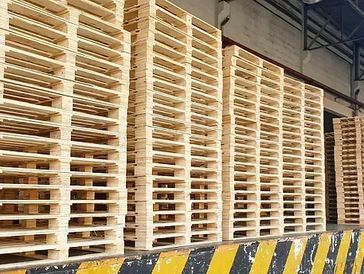 Heavy-duty block pallets stacked in warehouse