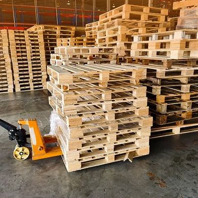 KC Pallets team removing scrap pallets from a warehouse