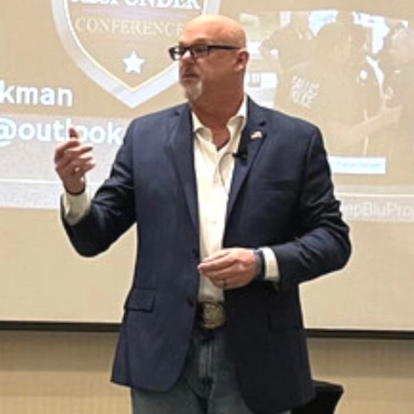 Christopher Workman speaking to public safety professionals about leadership and wellness