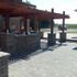 2000 sq. ft. paver patio with double "L" shaped concrete bar and huge "L" shaped pergola.  Also has 