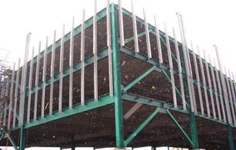 A parking structure coated with BRUGALCOLOR Green