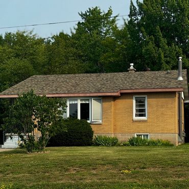 well-maintained house with lawn