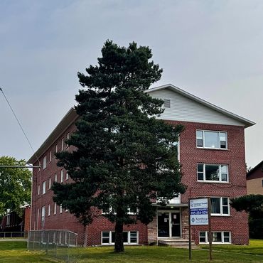 Residence with a tree in front