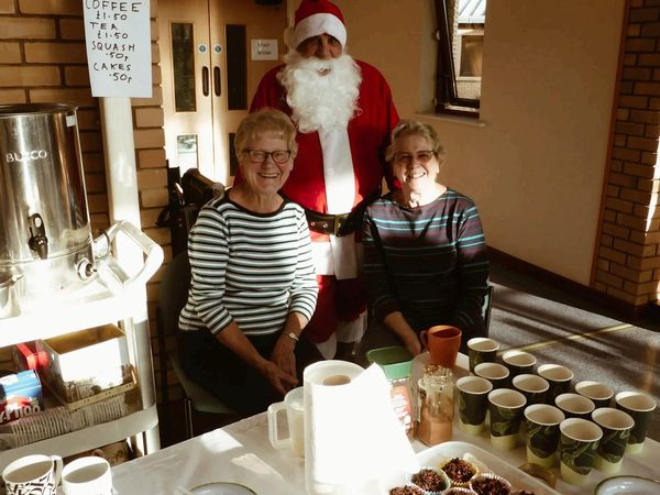 Father Christmas and volunteers.