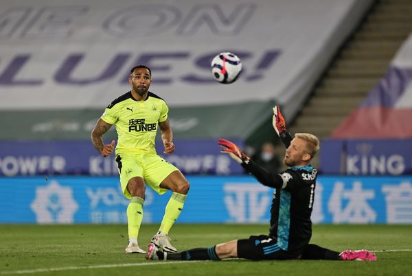 Newcastle United's Callum Wilson lobs Kasper Schmeichel of Leicester City in the Premier League.