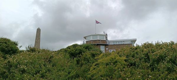 White Cliffs of Dover. Dover Patrol Cenotaph and lighthouse. Saxon Shore Way. England Coastal Path.