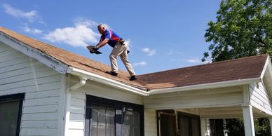 Roof inspected by inspector, man on roof - Allegiance Residential Inspections of Texas 