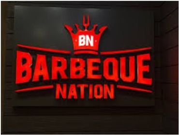 Barbeque Nation illuminated sign with logo.