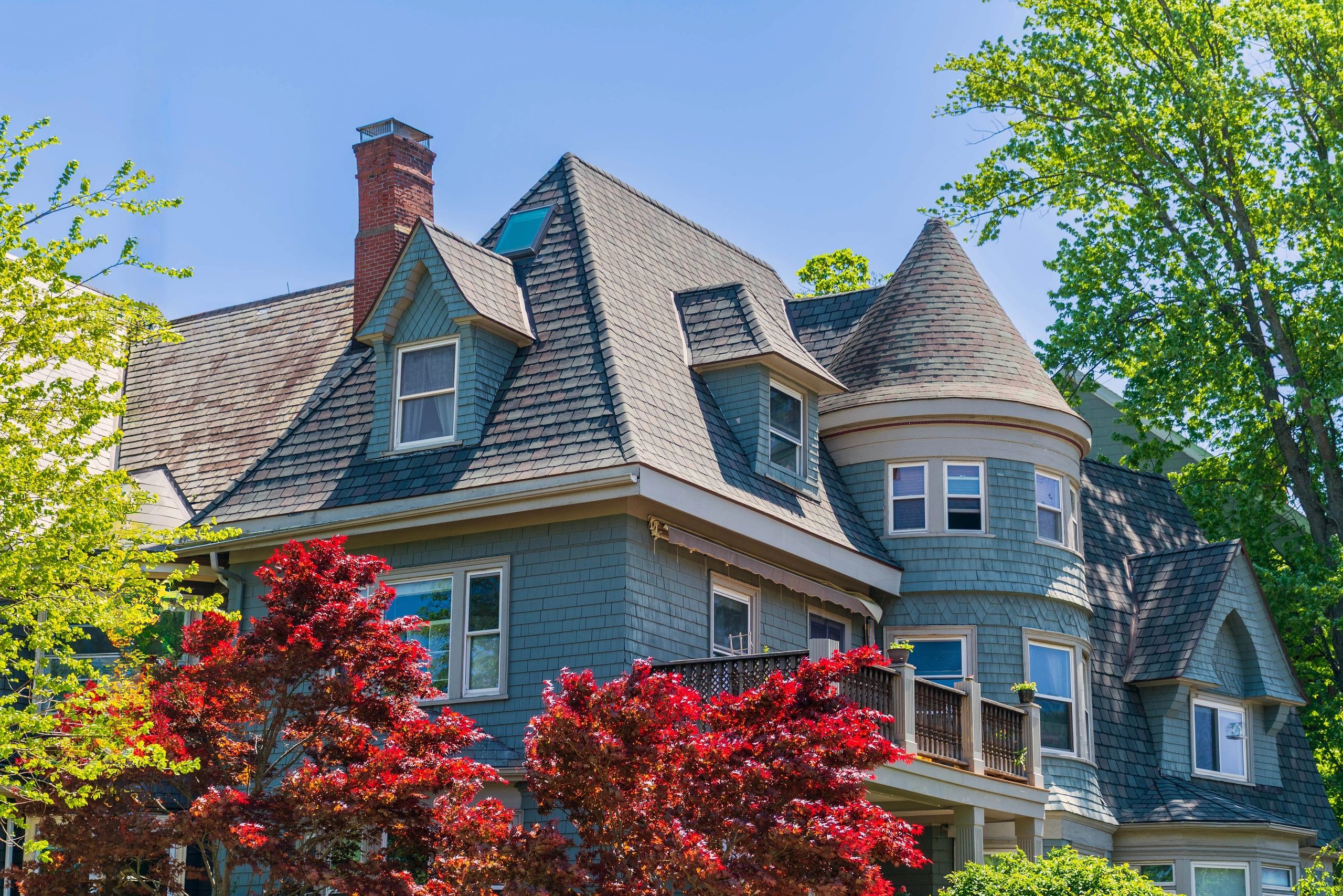 A grand Victorian home in Arlington, MA with new gutters