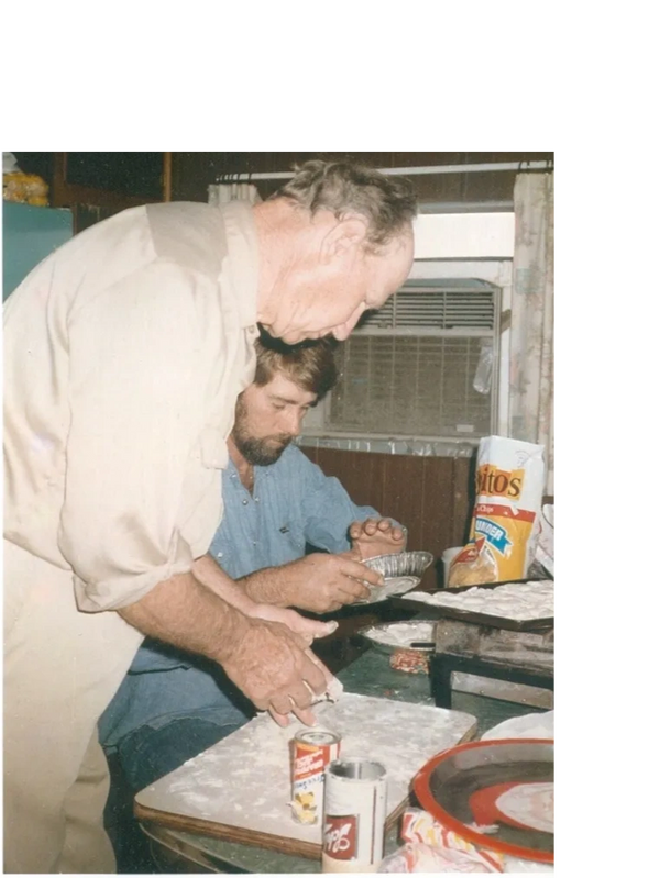 Dad and Grandpa making skip rocks - early 1980s
(Notice the Schlitz biscuit cutter.)