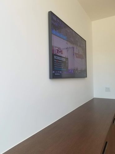 No gape wall-mounted Frame TV.