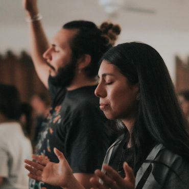 Young couple worshiping