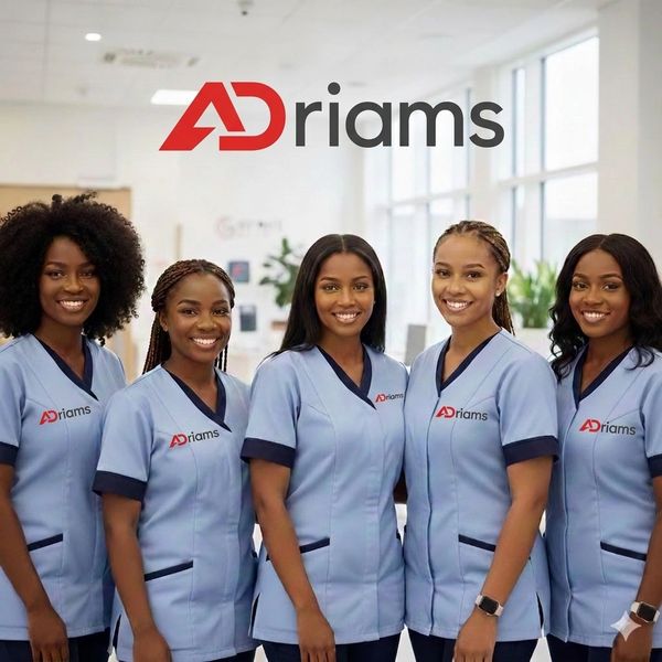 Five women in blue medical scrubs with ADriams logo.