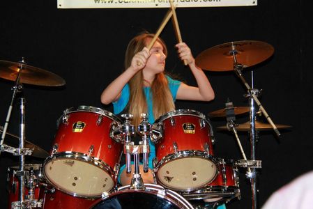 A girl taking drum lessons in Austin, TX