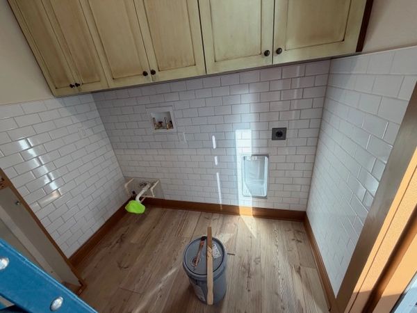 Mud room renovation with new cabinets countertops.