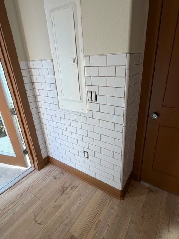 Mud room renovation with new cabinets countertops.