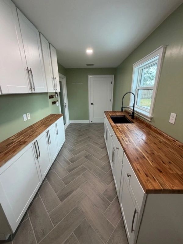 Mud room renovation with new cabinets countertops.