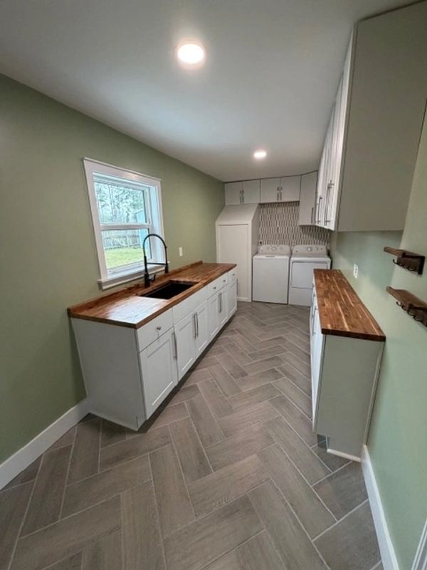 Mud room renovation with new cabinets countertops.