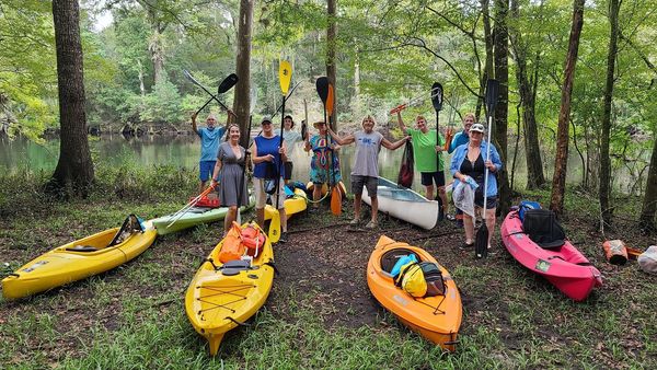 Happy group kayaking the Santa Fe River and springs