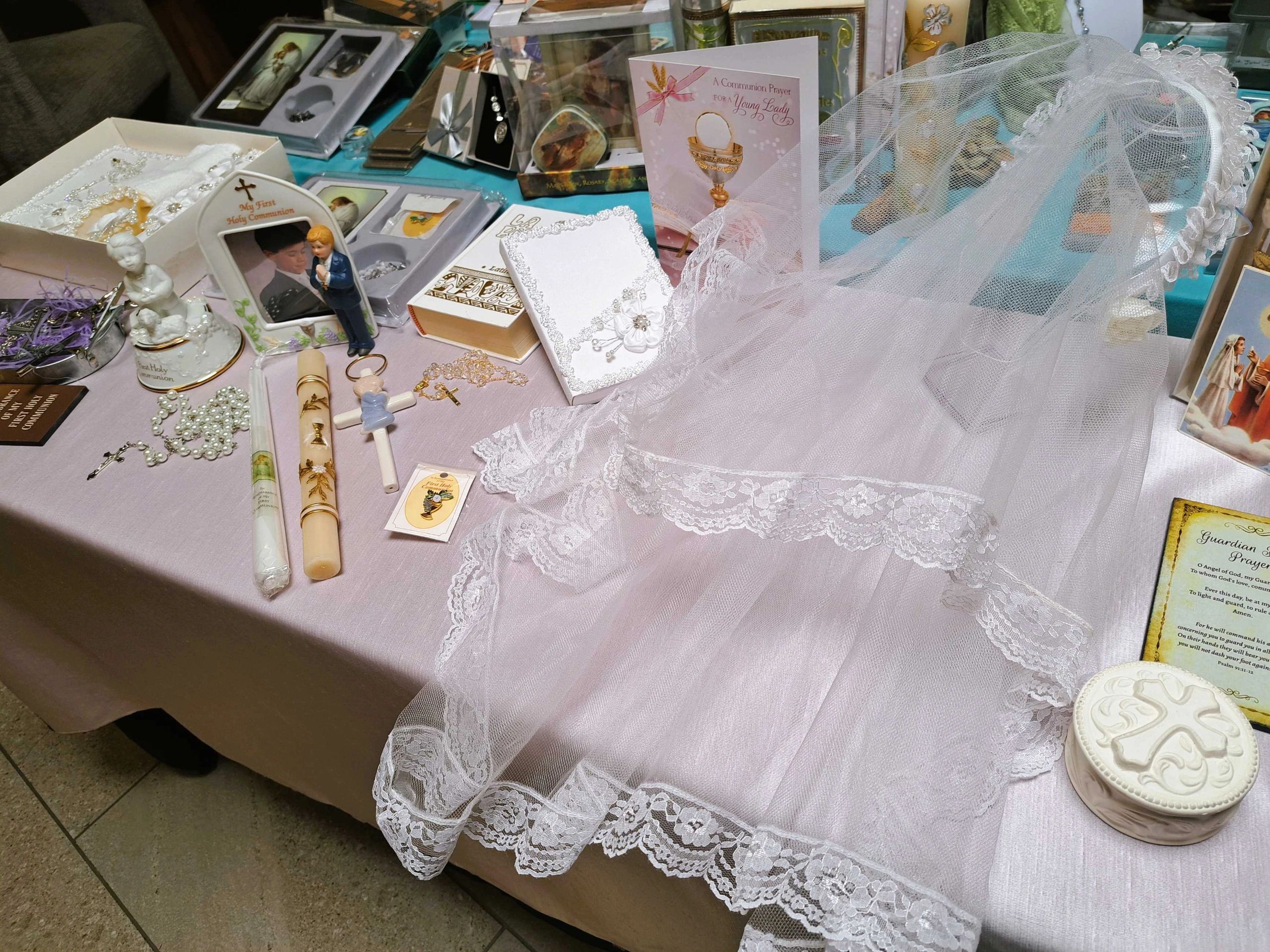 Table covered with first communion items,
