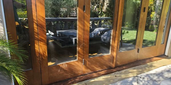 Folding Door restoration, refinish bottom threshold with walnut stain and epoxy top coat.