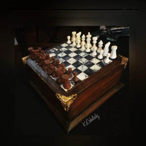 Chessboard cake with chocolate and vanilla pieces.
