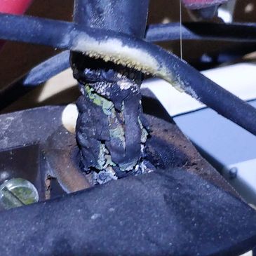 Severely damaged main electrical supply tails found in EICR check