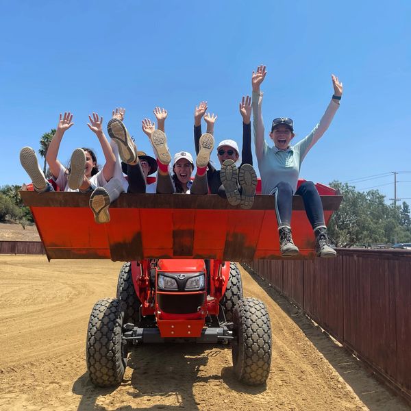 Horseback riding summer camp in san diego people sitting in a tractor proclaimer
