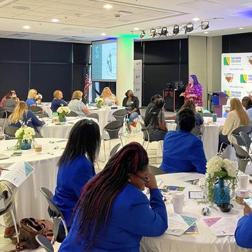 Libby Cole, Enneagram Coach, leading workshop with institute of higher education