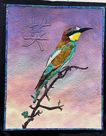 Here's my latest quilt, "Courage." This quilt took 40 hours and 18 different colors of thread. The b