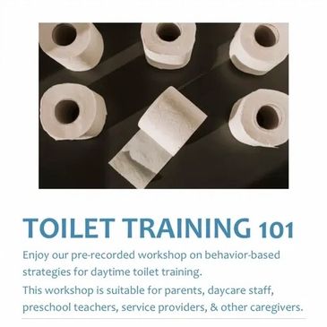 6 rolls of toilet paper on a dark background.