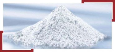 A mound of fine white powder on a smooth surface.