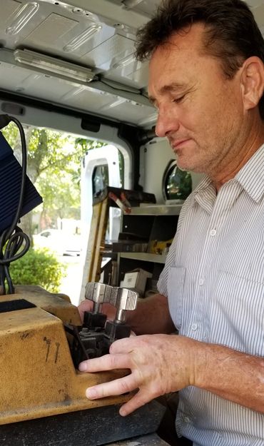 Locksmith working key machine