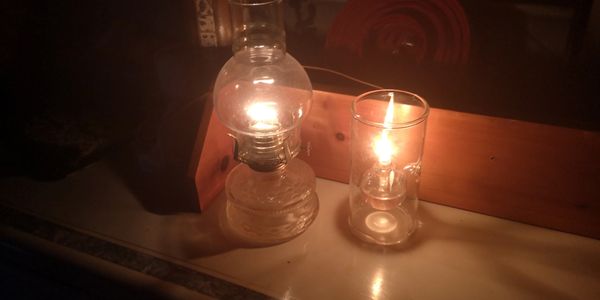 Oil lanterns on a dresser.
