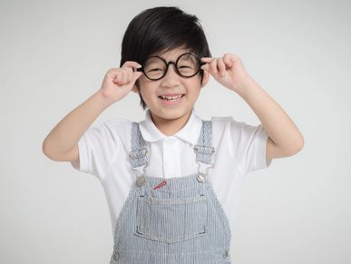 Kid wearing glasses - image about special needs adoptions 