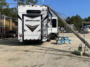 Storm Damage Toppled Utility Pole Over Onto This Fifth Wheel RV